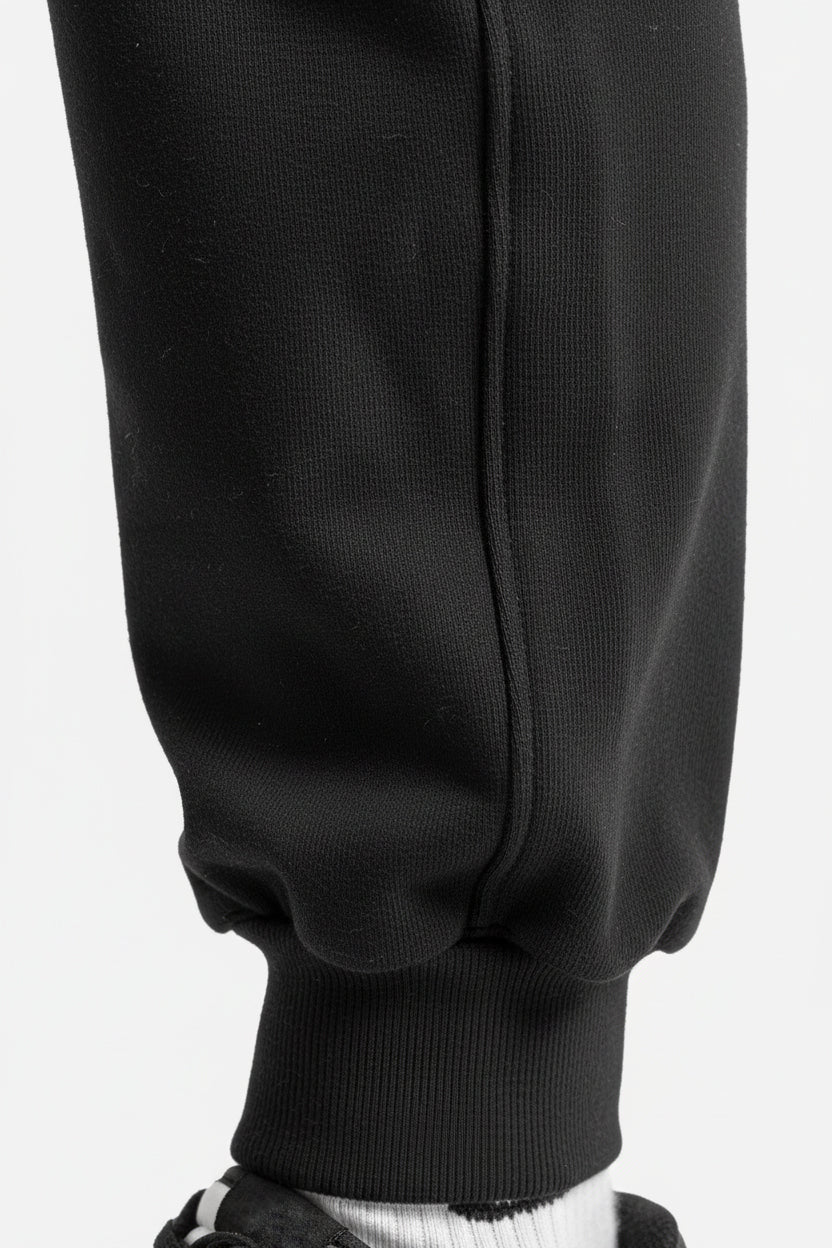Pantalone con logo embossed