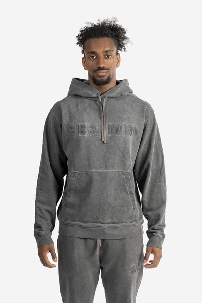 Felpa marmorizzata over size con logo embossed