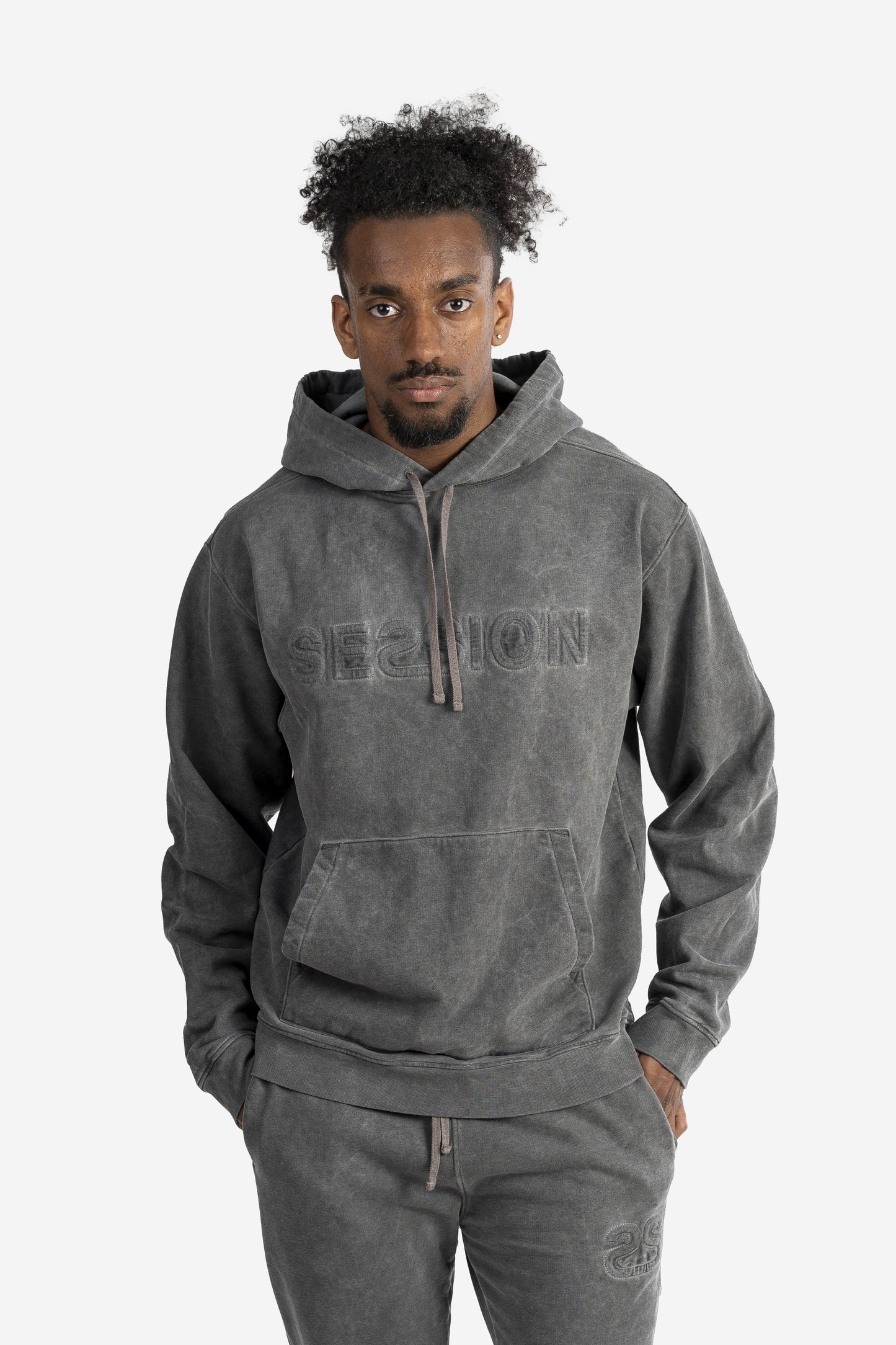 Felpa marmorizzata over size con logo embossed