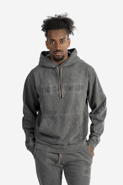 Felpa marmorizzata over size con logo embossed