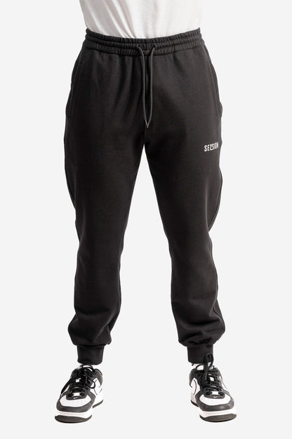 Pantalone con micro logo