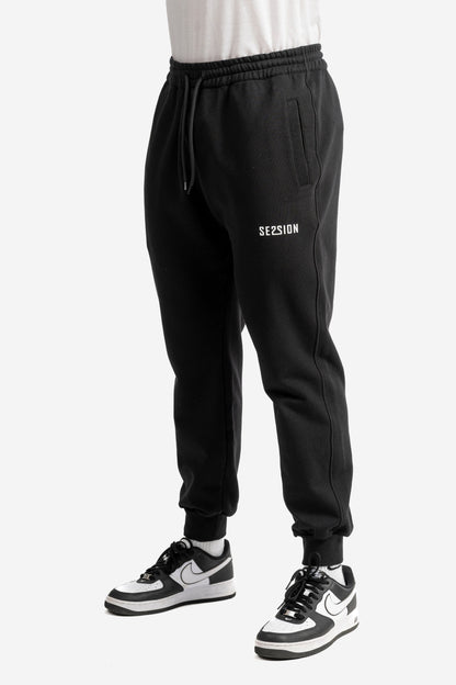 Pantalone con micro logo