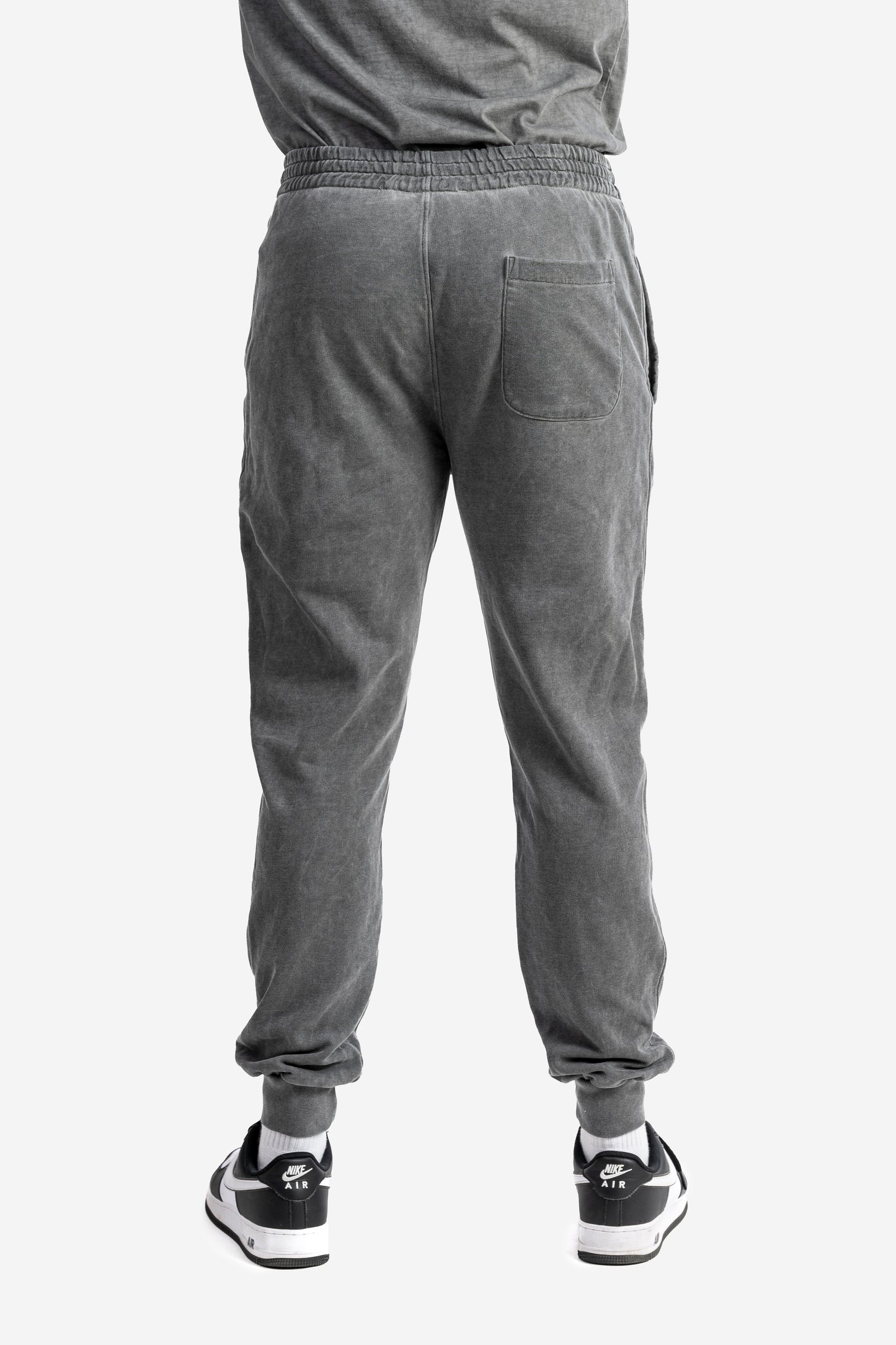Pantalone marmorizzato con logo embossed