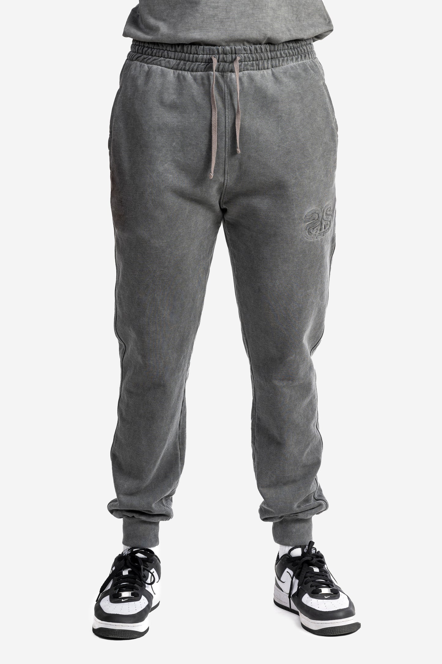 Pantalone marmorizzato con logo embossed