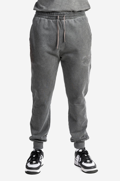 Pantalone marmorizzato con logo embossed