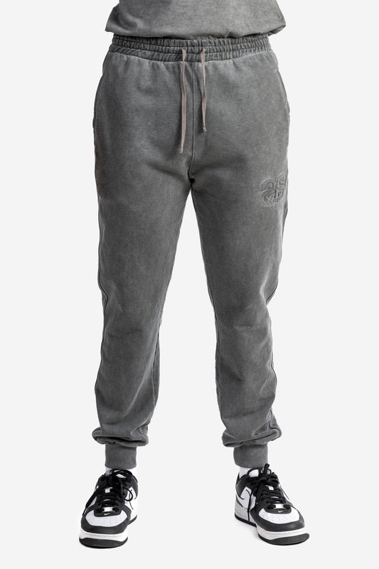 Pantalone marmorizzato con logo embossed