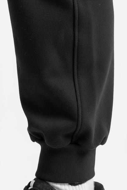 Pantalone con logo embossed