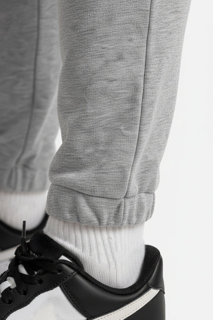 Pantalone con micro logo