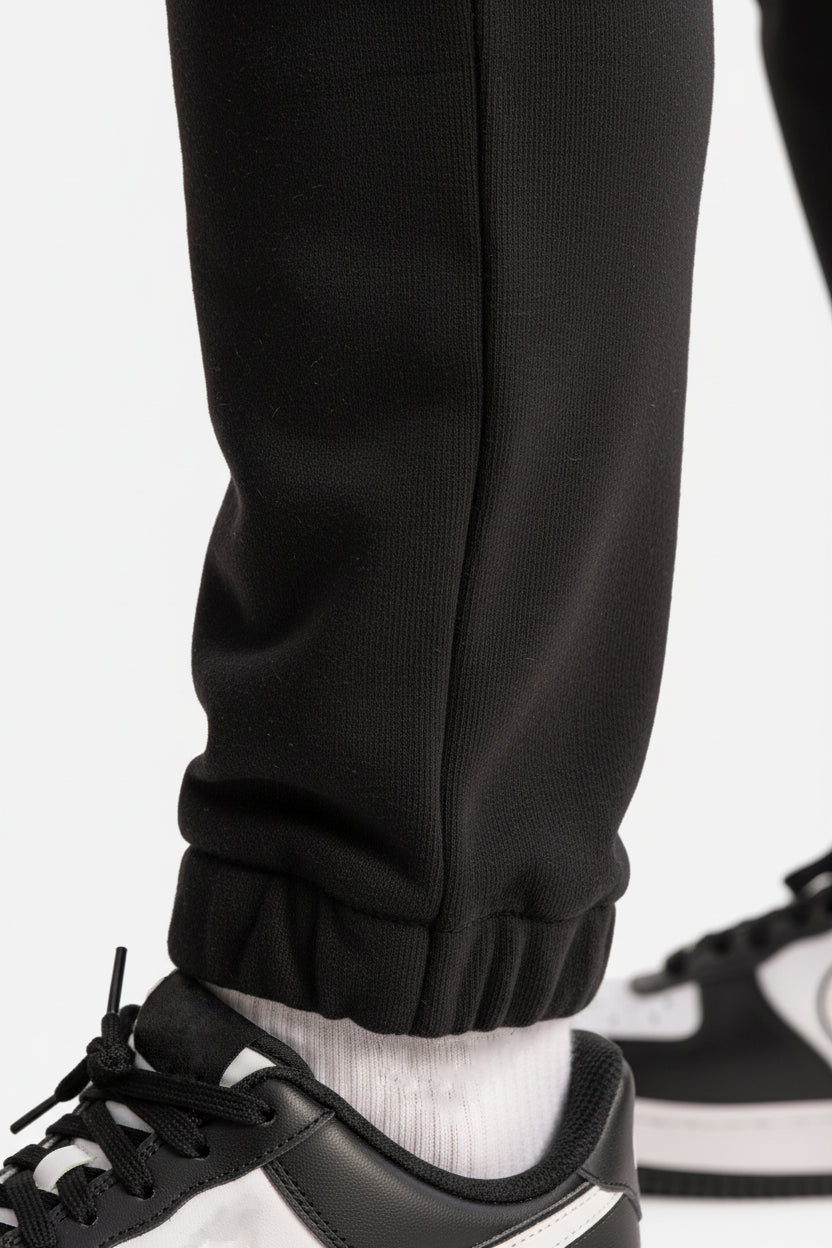 Pantalone con micro logo